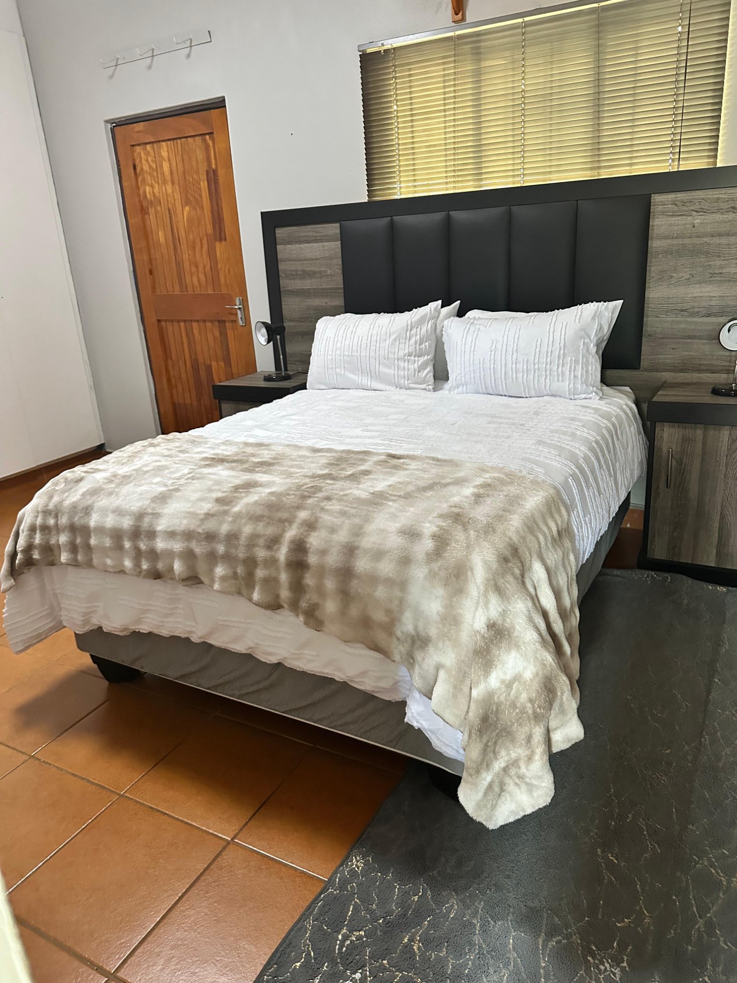 Second queen bedroom sharing bathroom at Dream and Drift Pretoria West